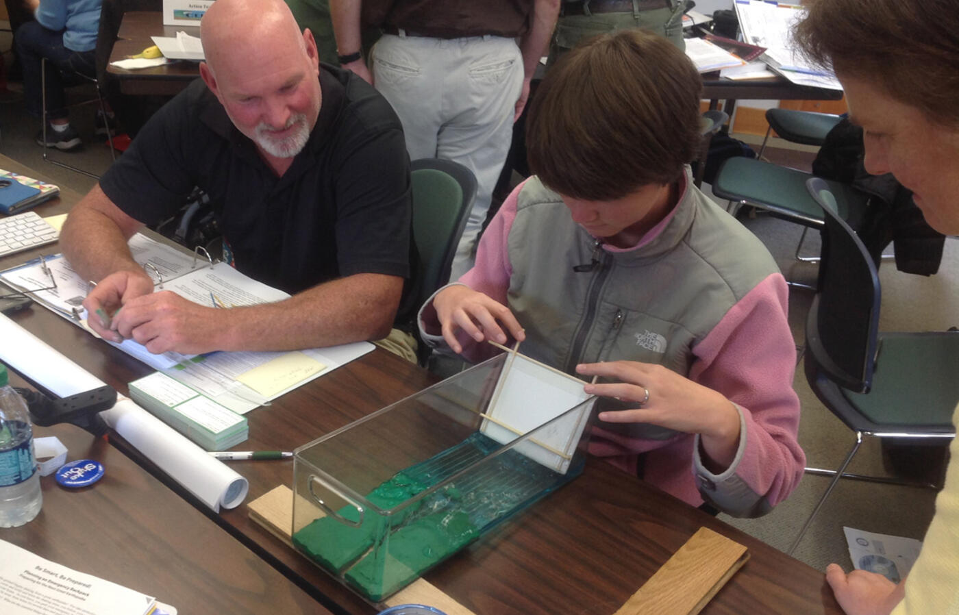 CEETEP participants practice using a tsunami wave tank model.